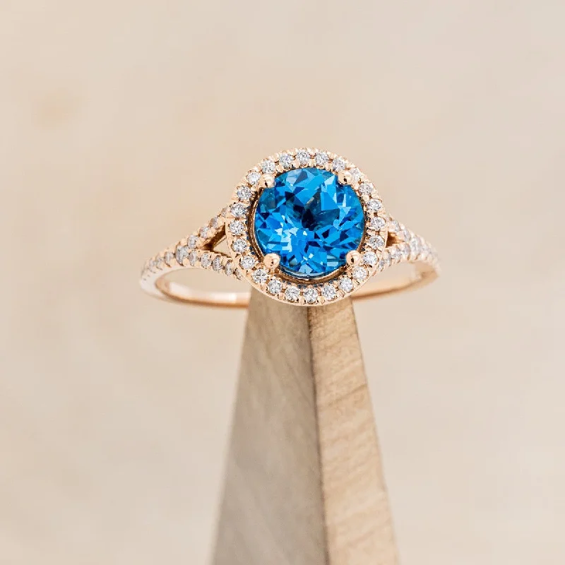 "AURA" - BIRTHSTONE RING WITH A SKY BLUE TOPAZ CENTER STONE WITH DIAMOND HALO & ACCENTS