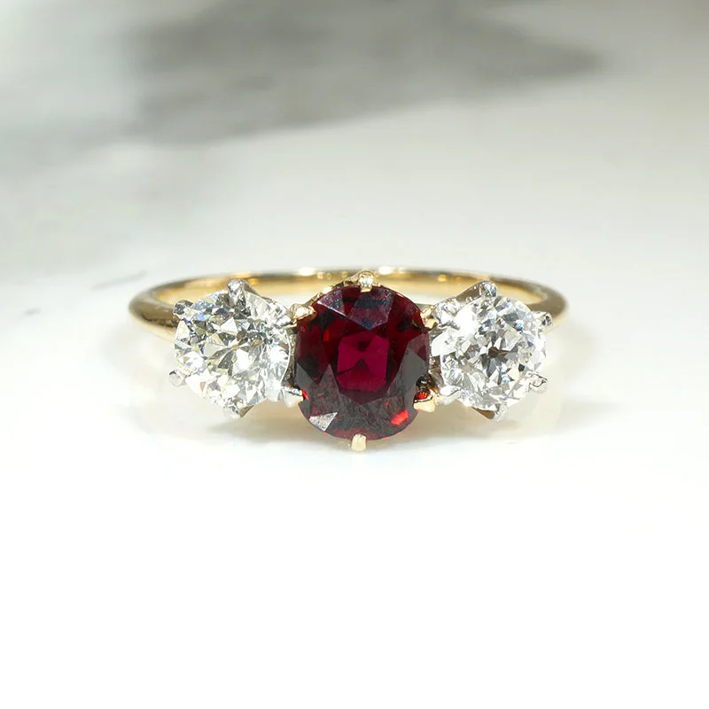 Incredible Ruby in Trilogy Ring with Dazzling Diamonds