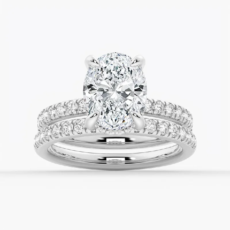 Micropavé Oval Hidden Halo Moissanite Ring Set with Matching Wedding Band