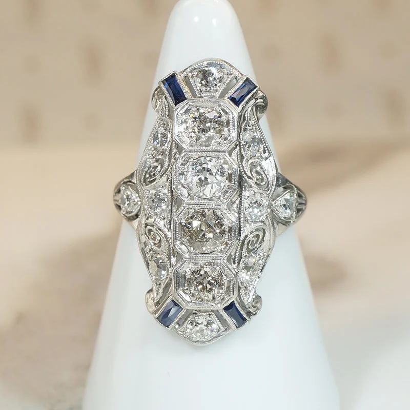 Outrageous Diamond Knuckle Ring with Sapphire Accents