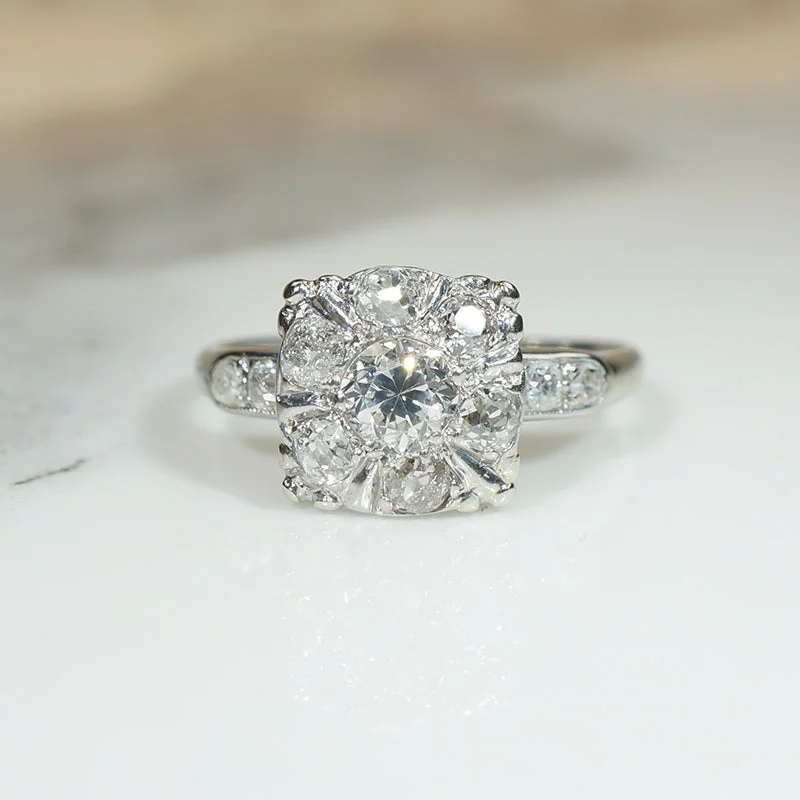 Antique Diamond Cluster in Platinum Engagement Ring