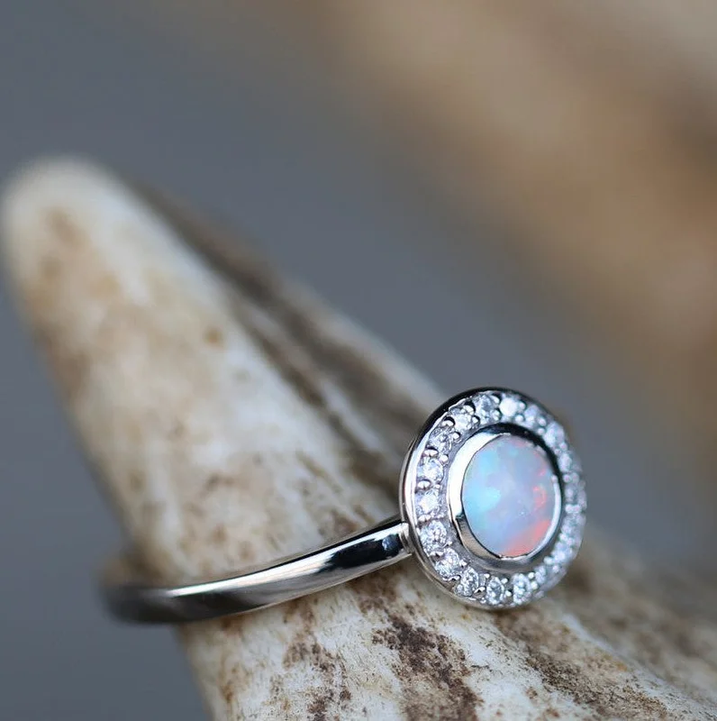 "TERRA" - ROUND CABOCHON CUT OPAL ENGAGEMENT RING WITH DIAMOND HALO