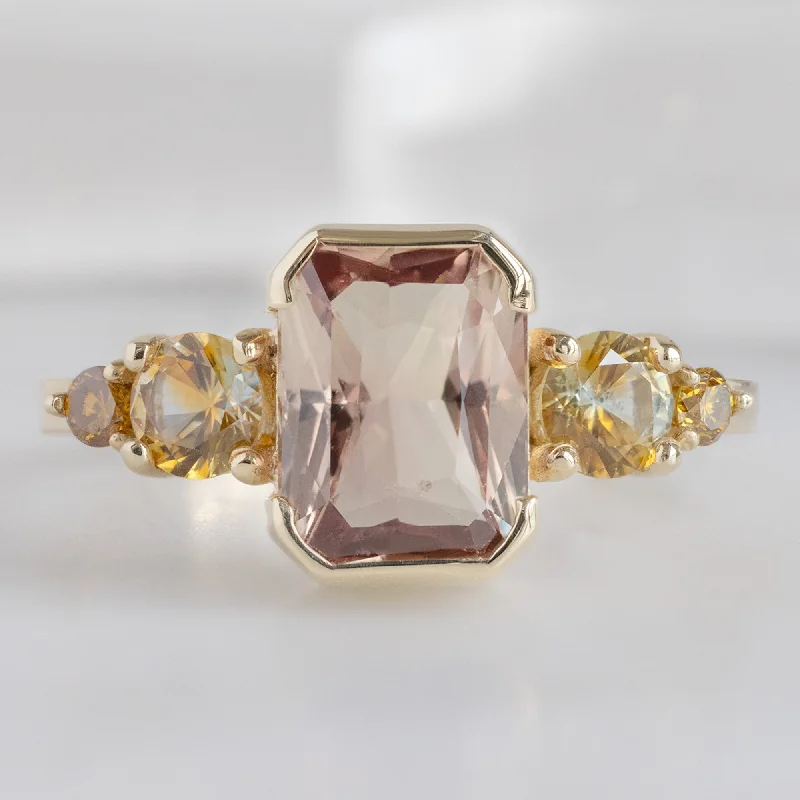 The Watercolor Ring | 2.04ct Emerald Cut Peach Sapphire in 14K Yellow Gold