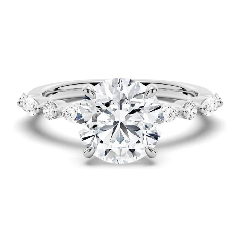 Unique Round Cut Engagement Ring With Marquise Accents